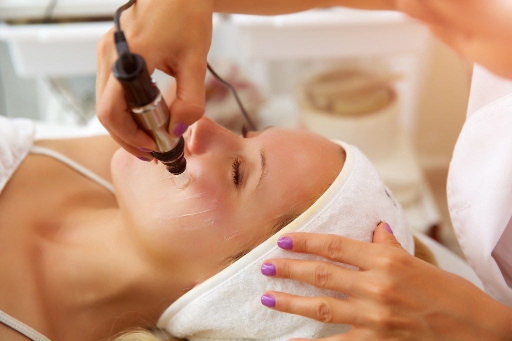 Microneedle meso therapy, treatment woman at the beautician spa salon