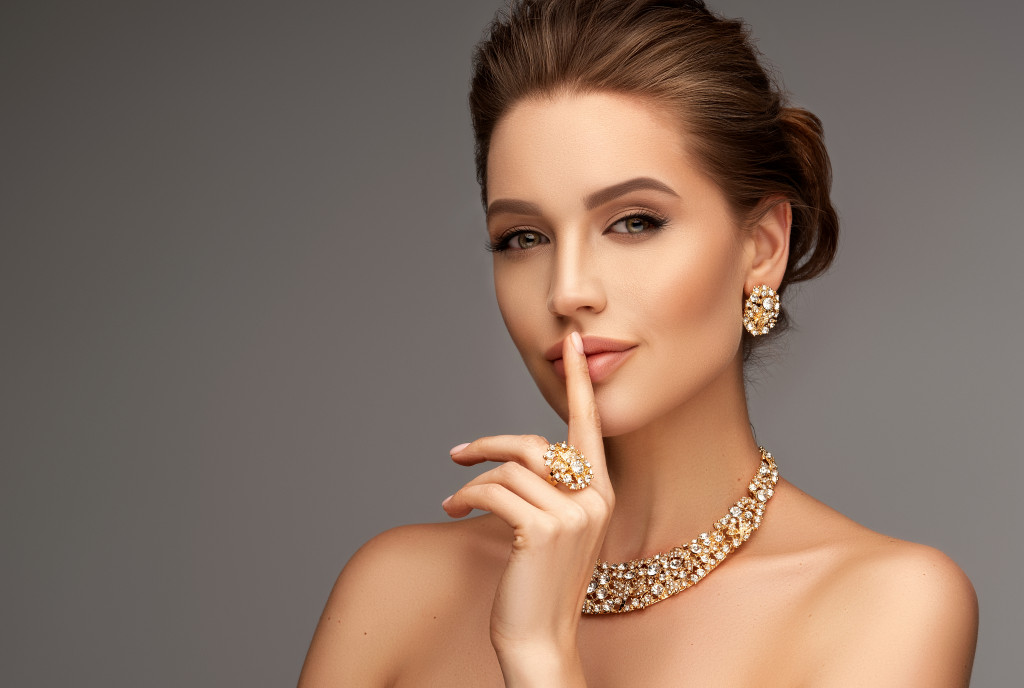 woman wearing jewelries