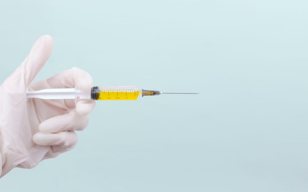 yellow liquid in the syringe