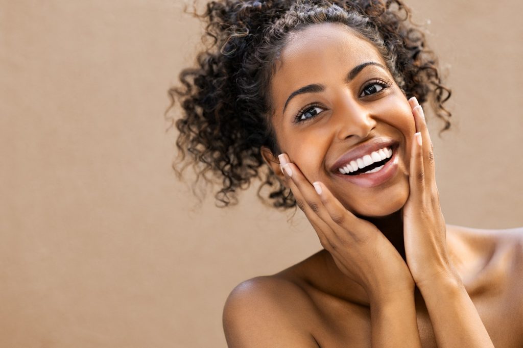 woman smiling after spa treatment